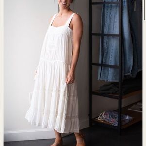 M.A.B.E ivory dress NWT size small. Never worn.